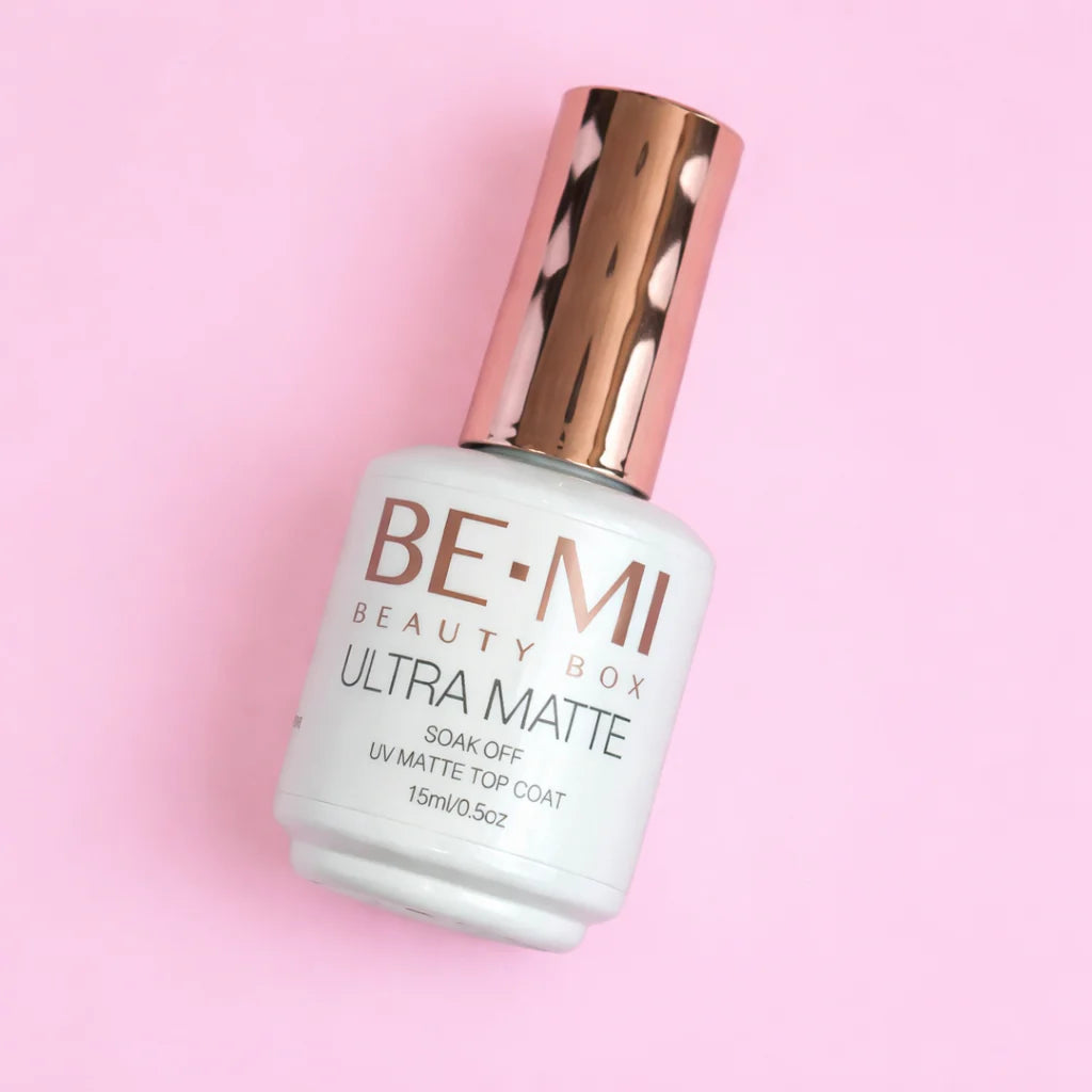 BE-MI nail polish bottle on a pink background